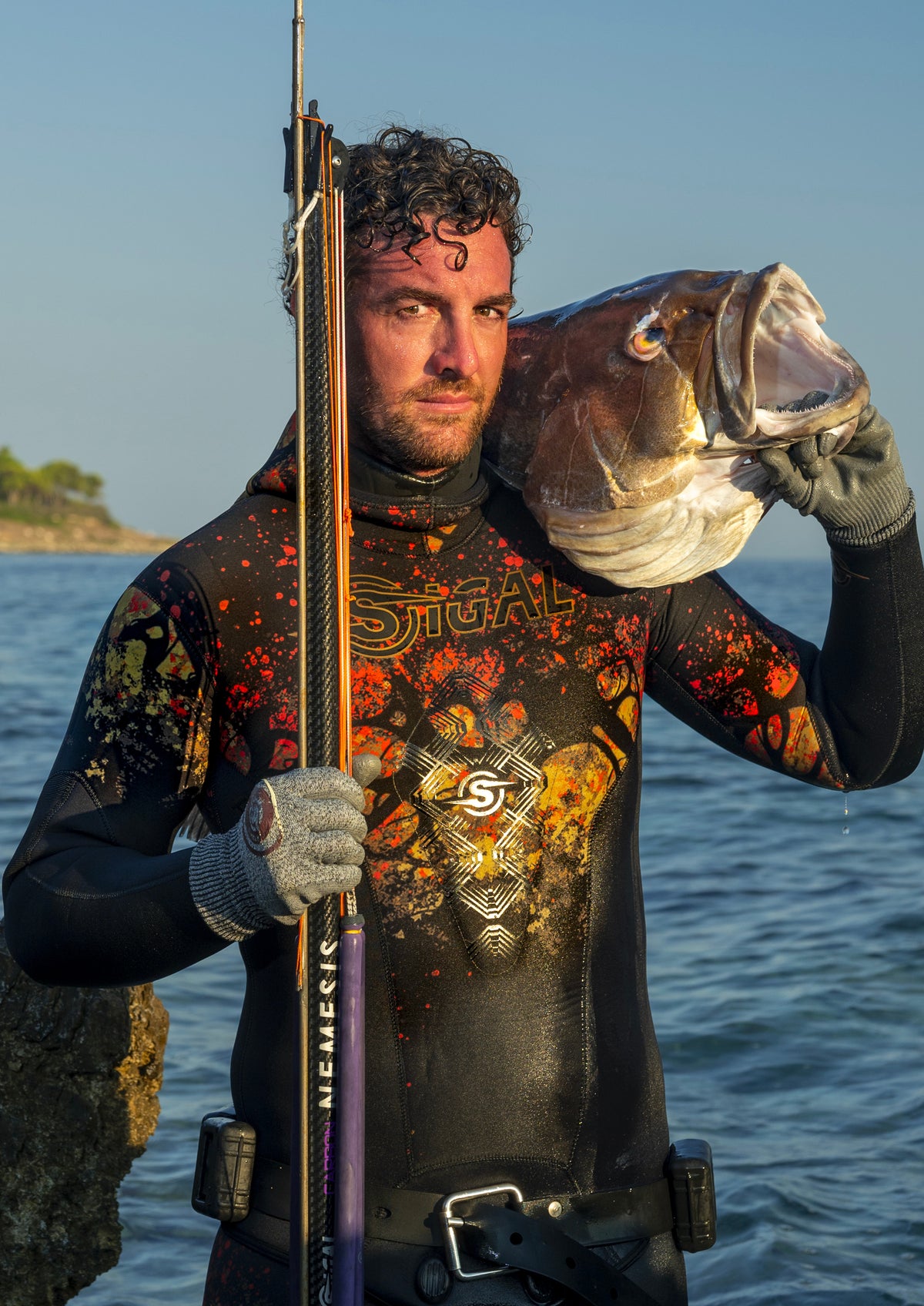 SIGALSUB Hydra camouflage wetsuit worn while spearfishing